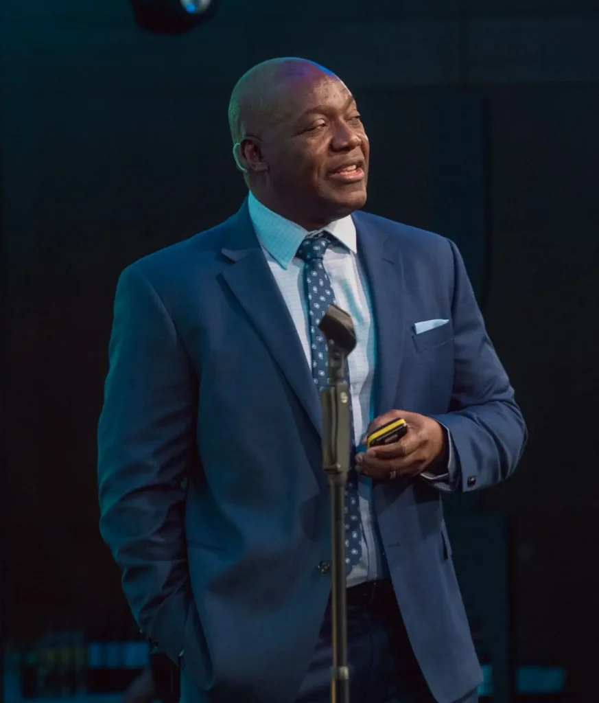 Devon Harris professional emcee on stage at a corporate event