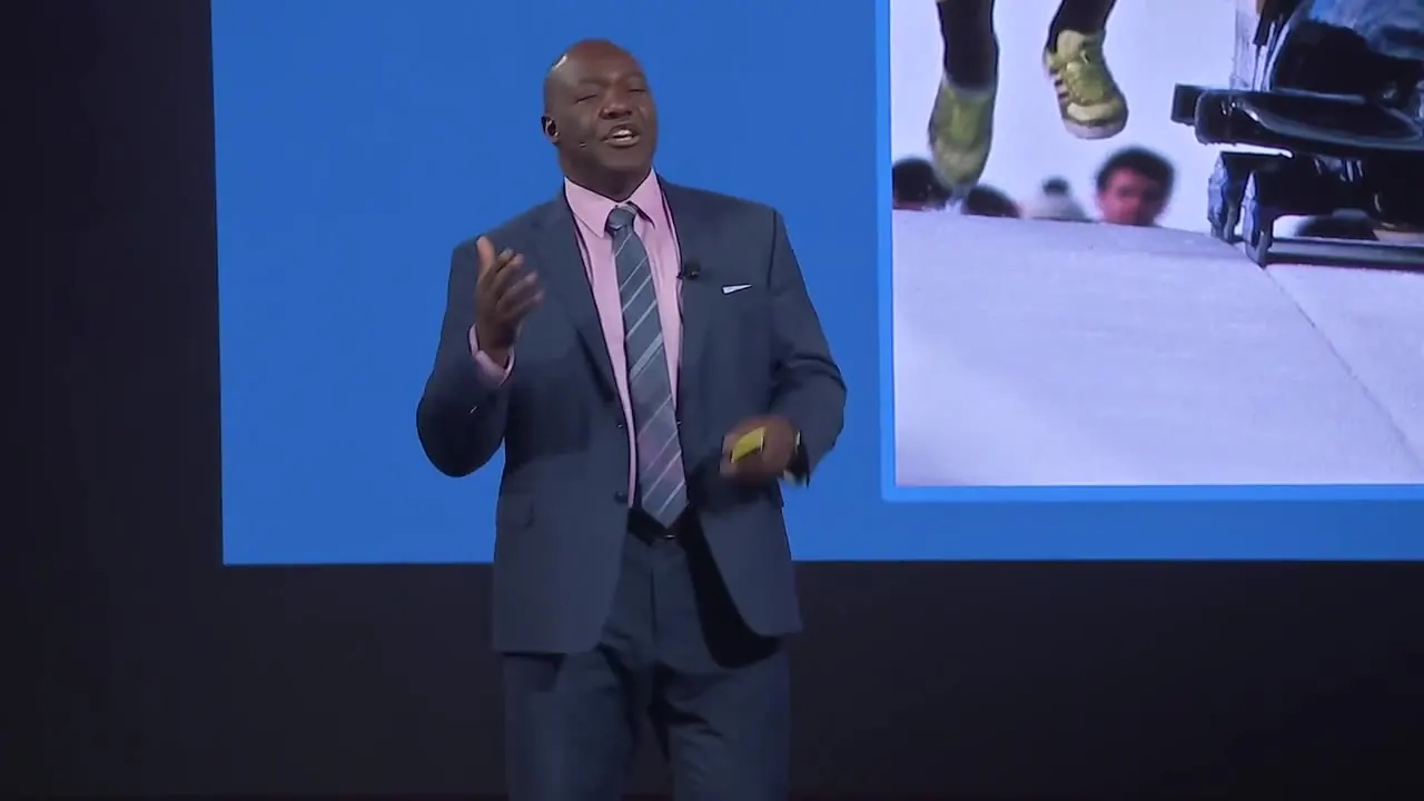 Devon Harris on stage with a keynote built around the event theme
