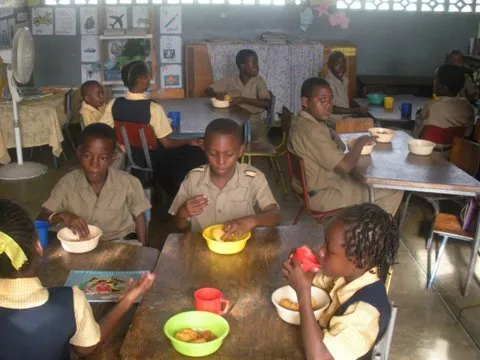 Students eating breakfast through the Keep On Pushing Foundation breakfast program