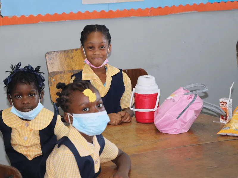 Students at their desk at a school supported by the foundation